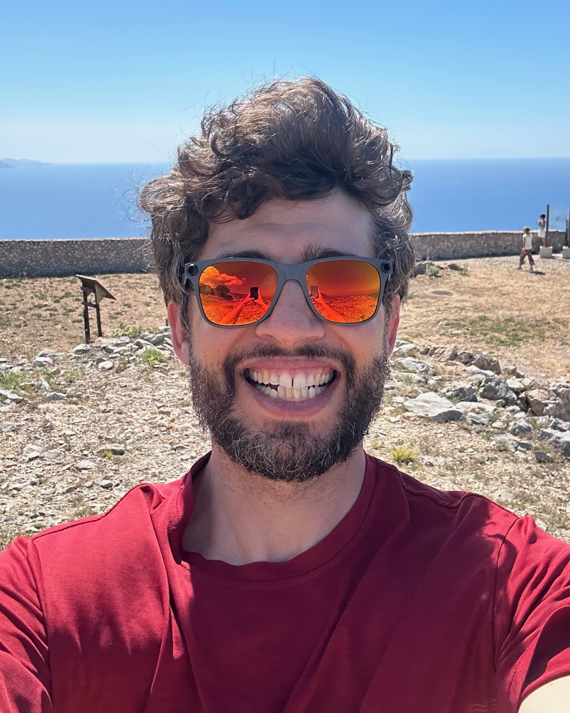 Marco smiling outdoors